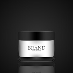 Black container pearl white cream jar on black background