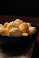 Brazilian snack callled cheese bread 'pao de queijo', homemade cheese buns. tipycal snack from minas gerais, Brazil.