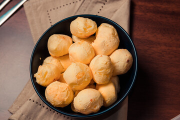 Brazilian snack callled cheese bread 'pao de queijo', homemade cheese buns. tipycal snack from minas gerais, Brazil.