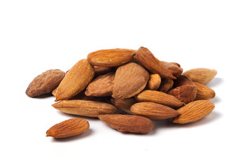 Almond kernels isolated on white. Heap of almond nut kernels