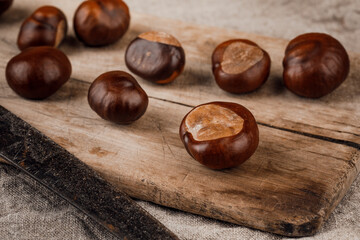 Chestnuts on an old wooden table