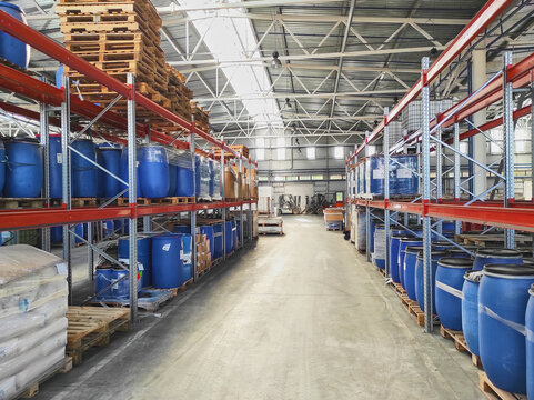 Large modern warehouse with equipment and shelves