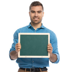 handsome casual man presenting his board at the camera