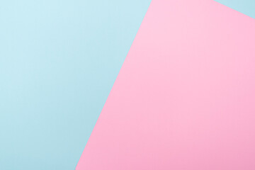 Composition with two color paper blue and pink, pastel tone, lay out with space for text
