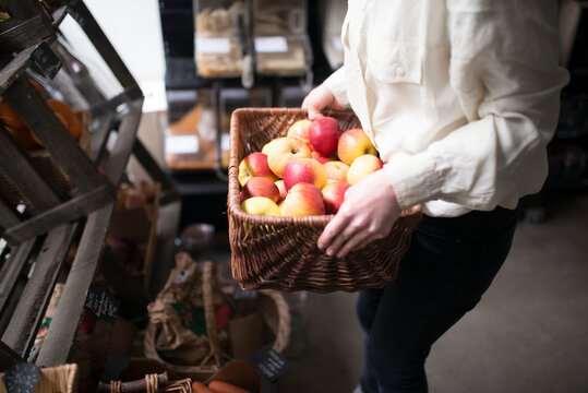 Woman working in organic shop, Sweden