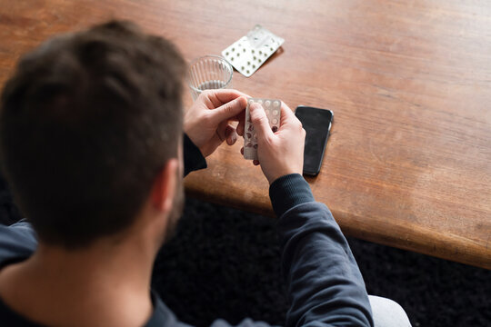 Man taking medicines, Sweden