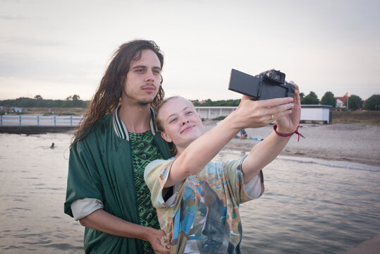 Couple taking selfie, Sweden