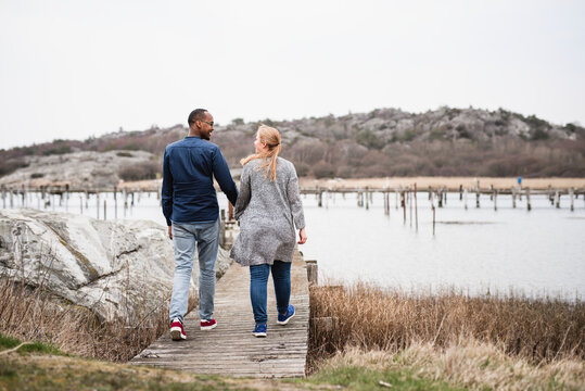 Couple on jetty, Sweden
