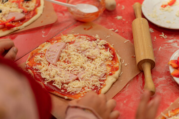 Children's pizza cooking master class Baby's hands making pizza