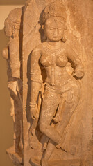 Fototapeta na wymiar Bas-relief with dancing Apsara, or Surasundari at famous ancient Shree Eklingnath temple near Udaipur in Rajasthan, India