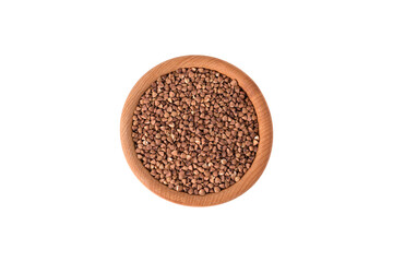 Buckwheat groats in wooden bowl on white background isolated, view from above