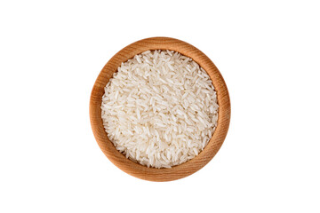 White rice in a wooden bowl on a white background isolated, view from above