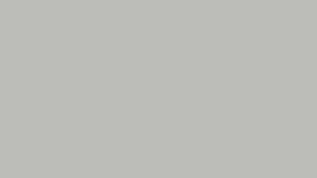 Medical capsules move diagonally from left to right on gray background