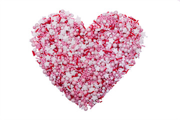 Heart of small pink pastry figures for cake decoration. Sweet pearls and, stars, sticks made up in the shape of a heart Isolated on a white background.