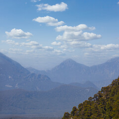 mountain valley in a blue mist, natural travel background