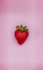 little strawberry on pink background