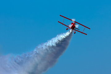A Pitts 2B performing aerobatics in the air - obrazy, fototapety, plakaty