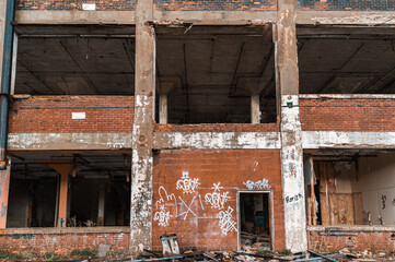 Obraz premium Detroit abandoned broken dystopian factory warehouse crumbling into nightmare apocalypse - Tilt Shift - winter landscape