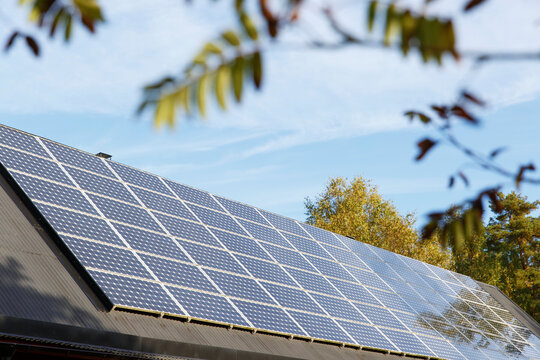 Low angle view of solar panels on roof, Sweden