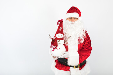 Santa Claus holding a snowman on white background. Christmas concept