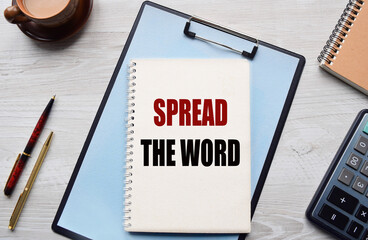 notebook with a conceptual inscription and a cup of coffee on a table