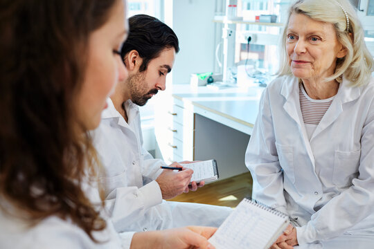 Scientists talking in laboratory, Sweden