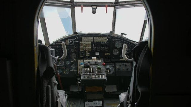 4K Close up of a planes cockpit showing instruments and panels from an old abandoned AN-2