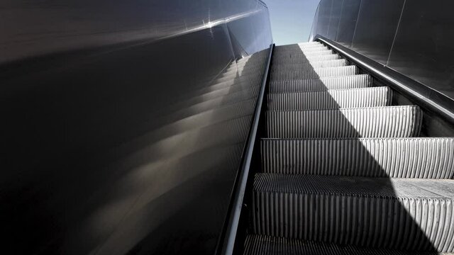 The escalator goes up. From a first person perspective
