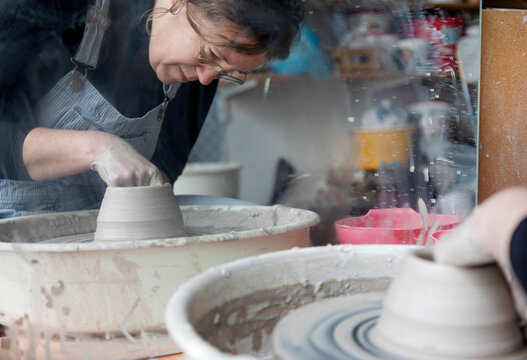 Woman using potters wheel, Sweden