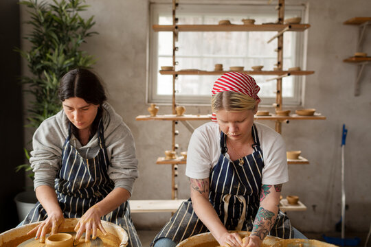 Women using potters wheels, Sweden