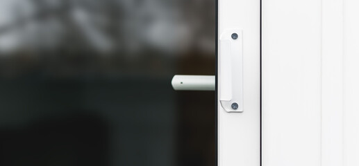 Fototapeta na wymiar Internal and external plastic door handles