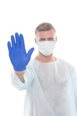 man medical worker epidemiologist stop covid19 showing gesture with hand in glove wear respirator mask and safety protective costume during, coronavirus quarantine