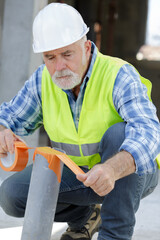 industrial senior worker on site