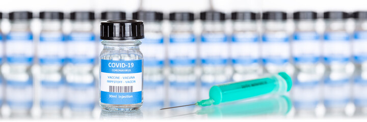 Coronavirus Vaccine bottle Corona Virus syringe COVID-19 Covid vaccines copyspace copy space panoramic