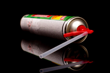 Polyurethane spray foam gun isolated on black