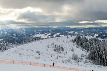 Skiing on mountain Zakhar Berkut, Carpathian mountains in Slavske, Ukraine on January 1, 2020. 