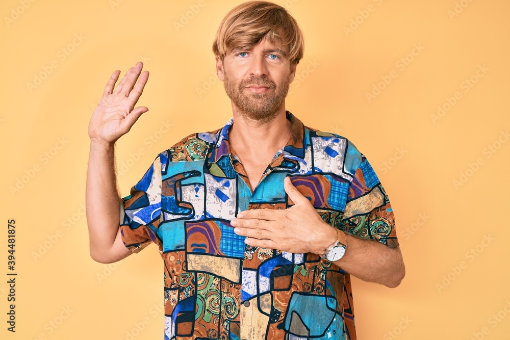 Sticker young blond man wearing summer shirt swearing with hand on chest and open palm, making a loyalty pro