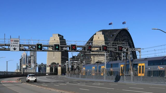 Fast Motion Of Motor Vehicle Traffic Entering Sydney Harbour Bridge In 4k.
