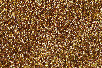 Yellow confetti background. Shiny grain texture. Glamour party effect pattern. Glowing noise...