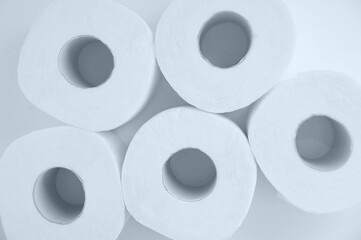 Rolls of toilet paper. White background. View from above.