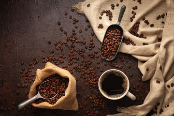 beautiful traditional coffee beans in rustic surface with scoops