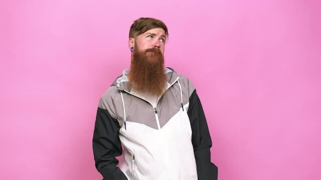 Young adult bearded caucasian man isolated confused, feels doubtful and unsure
