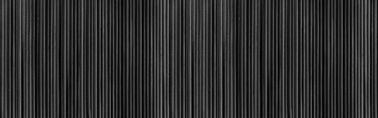 Panorama of Bamboo wall or Bamboo fence texture. Old black tone. Natural bamboo fence texture background