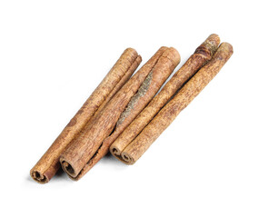 Brown cinnamon sticks isolated on white background. Aromatic food ingredients