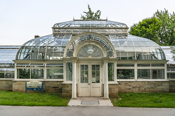 Fototapeta na wymiar Allan Gardens (founded in 1858) - one of oldest public parks in Toronto with conservatory (greenhouse) and playground. Toronto, Ontario, Canada.