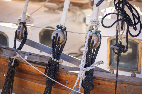 ropes and wooden blocks on an old yacht