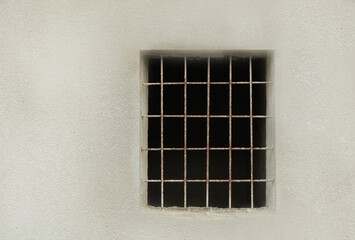 Window with bars to an abandoned house