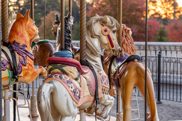 Fototapeta na wymiar Outdoor Carousel in the Autumn