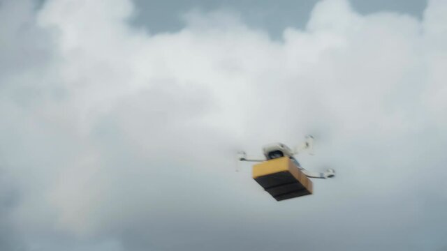 flying on a sky delivery drone with holding a .cardboard parcel