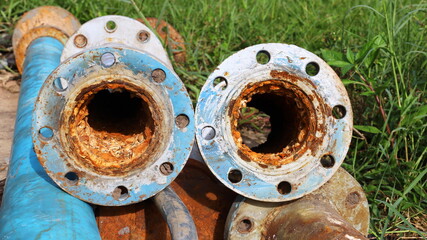 Old metal pipes clogged twin. Suspended solids in water contaminated with iron and manganese cause...